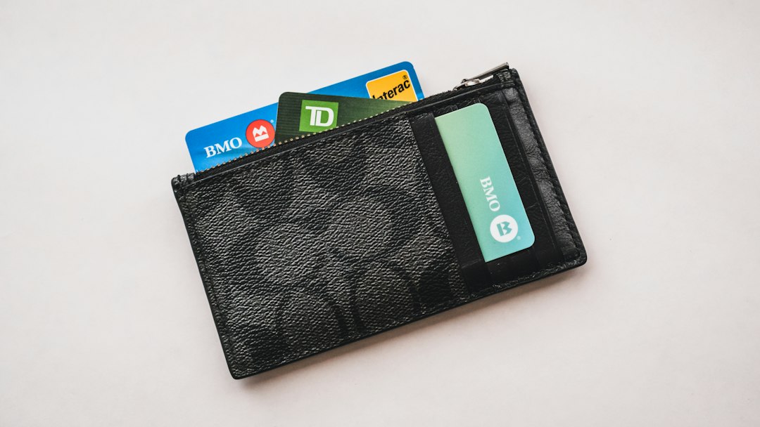 a wallet with credit cards sticking out of it