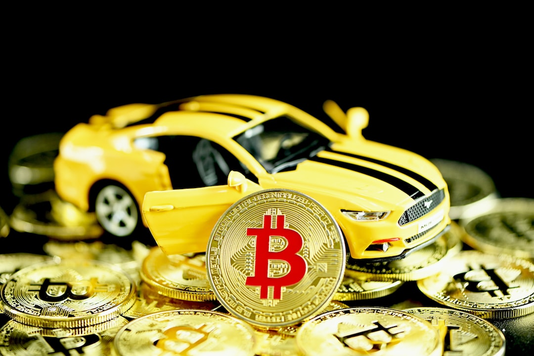 a yellow toy car sitting on top of a pile of gold coins